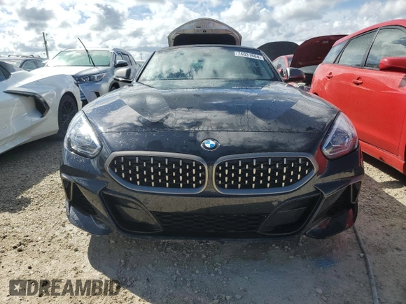2022 BMW Z4 sDriveM40i with VIN WBAHF9C04NWX90938, listed as a Copart auction lot 74031664 with 7,813 mi miles and Non repairable. Bid and sale history available at DreamBid. Image 5.