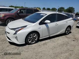 2017 Toyota Prius Two z VIN JTDKARFU7H3052384, wystawiony jako Copart lot #56228005 z przebiegiem 128 027 mil mil oraz Szkoda całkowita • Salvage title. Historia ofert i sprzedaży dostępna na DreamBid. Obrazek 1.