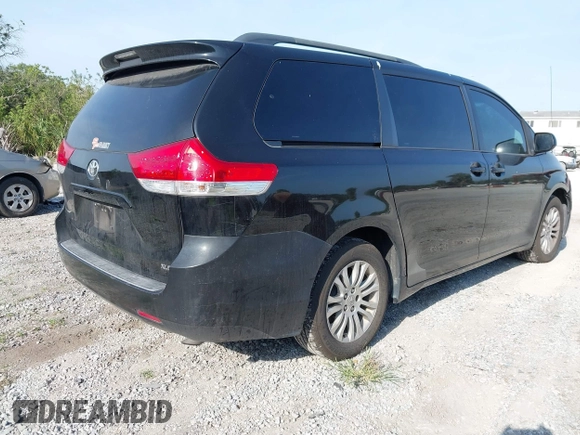 2011 Toyota Sienna XLE AAS with VIN 5TDYK3DC7BS051241, listed as a IAAI auction lot 42214806 with 253,860 mi miles and . Bid and sale history available at DreamBid. Image 4.