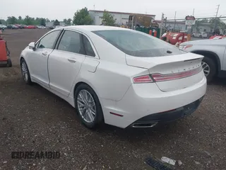 2016 Lincoln MKZ with VIN 3LN6L2JK9GR609137, listed as a IAAI auction lot 42679691 with 125,180 mi miles and . Bid and sale history available at DreamBid. Image 3.