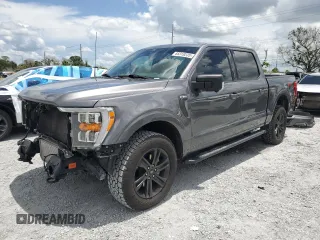 2021 Ford F-150 XL with VIN 1FTFW1E87MFC00633, listed as a Copart auction lot 65318235 with 91,264 mi miles and Salvage title. Bid and sale history available at DreamBid. Image 1.