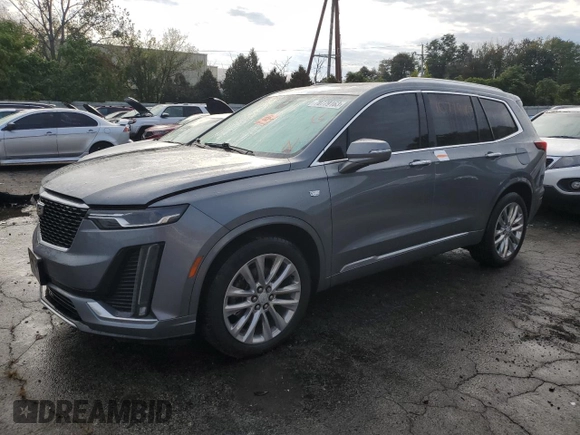 2021 Cadillac XT6 Premium Luxury z VIN 1GYKPDRS6MZ216642, wystawiony jako Copart lot #70779163 z przebiegiem 23 033 mil mil oraz . Historia ofert i sprzedaży dostępna na DreamBid. Obrazek 1.