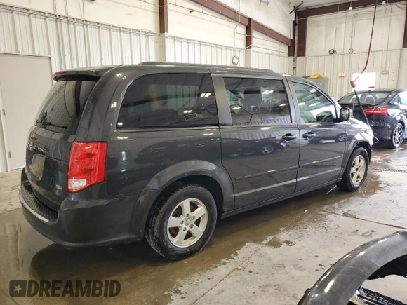 2012 Dodge Grand Caravan SXT with VIN 2C4RDGCG0CR191037, listed as a Copart auction lot 50930675 with 142,093 mi miles and Salvage Title. Bid and sale history available at DreamBid. Image 3.