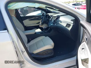 2018 Chevrolet Impala LT with VIN 1G1105S34JU106107, listed as a IAAI auction lot 41871693 with 111,412 mi miles and . Bid and sale history available at DreamBid. Image 5.