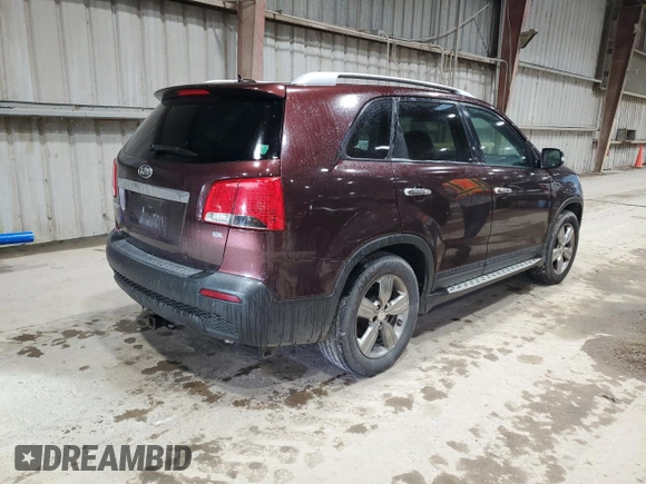 2012 Kia Sorento EX z VIN 5XYKU4A64CG219646, wystawiony jako Copart lot #59171315 z przebiegiem 185 806 mil mil oraz Czysty tytuł • Clean title. Historia ofert i sprzedaży dostępna na DreamBid. Obrazek 3.
