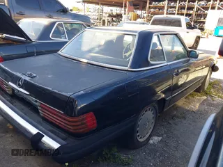 1989 Mercedes-Benz 560 with VIN WDBBA48D1KA095197, listed as a IAAI auction lot 41440418 with Not Provided miles. Bid and sale history available at carsss.com. Image 4.