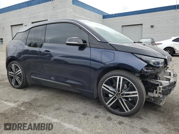 2019 BMW i3 with VIN WBY8P4C57K7E79770, listed as a Copart auction lot 55701535 with 33,344 mi miles and Salvage title. Bid and sale history available at DreamBid. Image 4.