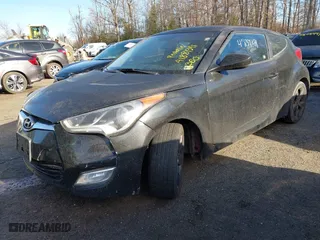 2015 Hyundai Veloster with VIN KMHTC6AD0FU245001, listed as a IAAI auction lot 41881391 with 119,873 mi miles. Bid and sale history available at carsss.com. Image 2.