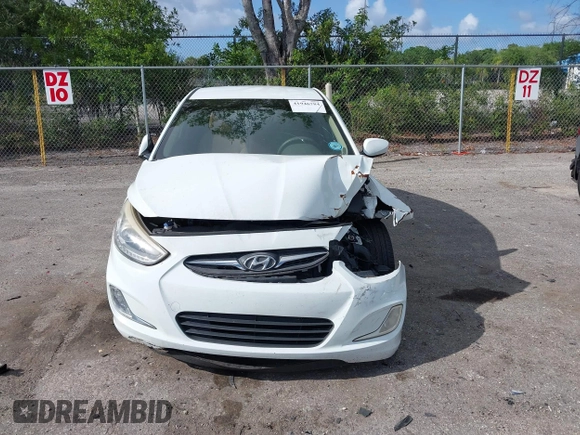 2014 Hyundai Accent GLS with VIN KMHCU4AE8EU608539, listed as a IAAI auction lot 41946784 with 106,709 mi miles and . Bid and sale history available at carsss.com. Image 11.