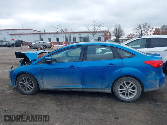 2017 Ford Focus SE with VIN 1FADP3F24HL243981, listed as a IAAI auction lot 40987789 with 56,988 mi miles and . Bid and sale history available at DreamBid. Image 14.