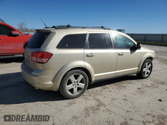 2010 Dodge Journey SXT with VIN 3D4PH5FV5AT169610, listed as a Copart auction lot 49323215 with 243,471 mi miles and Salvage Title. Bid and sale history available at carsss.com. Image 3.