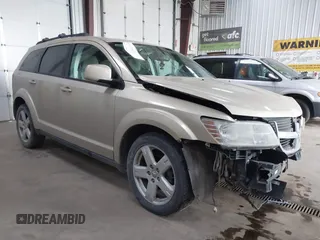 2010 Dodge Journey SXT with VIN 3D4PH5FVXAT180831, listed as a IAAI auction lot 41506328 with 155,482 mi miles. Bid and sale history available at carsss.com. Image 1.