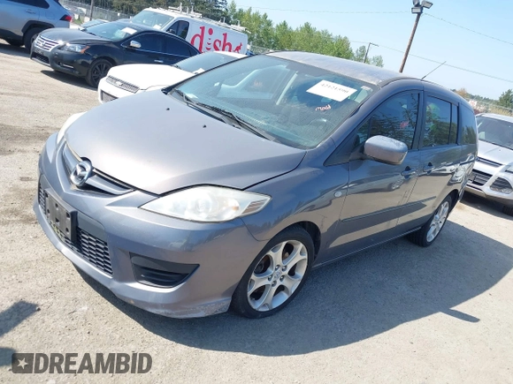 2009 Mazda Mazda5 Sport with VIN JM1CR293890352218, listed as a IAAI auction lot 42121590 with 168,302 mi miles. Bid and sale history available at carsss.com. Image 2.
