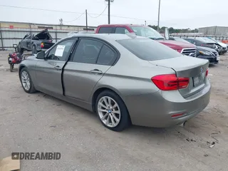 2018 BMW 3 Series 320i with VIN WBA8E1G51JNU92342, listed as a IAAI auction lot 41641934 with 27,477 mi miles. Bid and sale history available at carsss.com. Image 3.