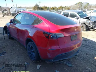 2023 Tesla Model Y Long Range with VIN 7SAYGDEE8PF709459, listed as a IAAI auction lot 41334108 with 51,544 mi miles. Bid and sale history available at carsss.com. Image 3.