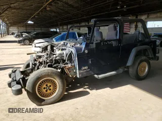 2005 Jeep Wrangler Unlimited with VIN 1J4FA44S65P376026, listed as a Copart auction lot 57692645 with Not provided miles and Clean title. Bid and sale history available at DreamBid. Image 1.