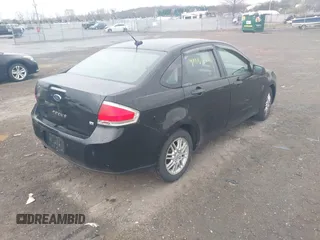 2009 Ford Focus SE with VIN 1FAHP35N39W139379, listed as a IAAI auction lot 41867140 with 234,817 mi miles. Bid and sale history available at carsss.com. Image 4.