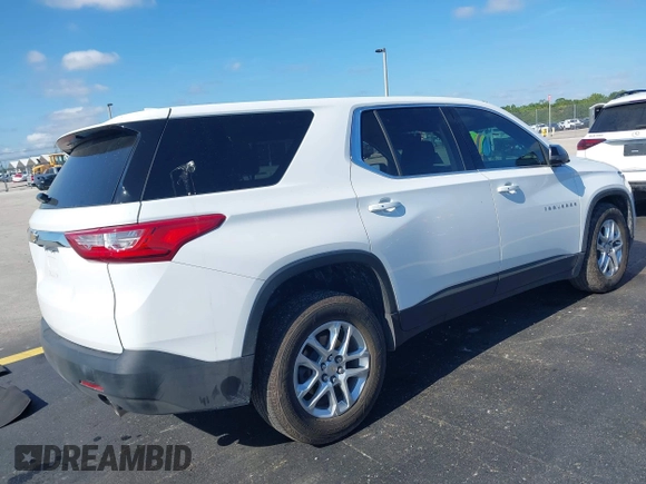 2021 Chevrolet Traverse LS with VIN 1GNERFKW0MJ240592, listed as a IAAI auction lot 42310680 with 59,986 mi miles and . Bid and sale history available at DreamBid. Image 4.