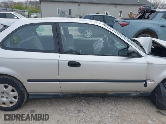 2000 Honda Civic DX z VIN 2HGEJ644XYH104197, wystawiony jako IAAI lot #42005938 z przebiegiem 125 321 mil mil oraz . Historia ofert i sprzedaży dostępna na DreamBid. Obrazek 14.