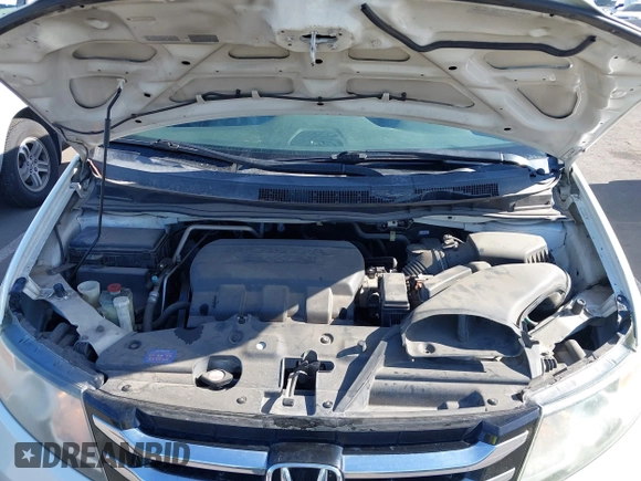 2014 Honda Odyssey Touring with VIN 5FNRL5H97EB037361, listed as a IAAI auction lot 42106742 with 198,279 mi miles and . Bid and sale history available at DreamBid. Image 10.