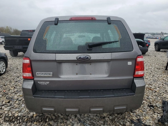2009 Ford Escape XLS z VIN 1FMCU02799KC31553, wystawiony jako Copart lot #55219775 z przebiegiem 109 154 mil mil oraz Szkoda całkowita • Salvage title. Historia ofert i sprzedaży dostępna na DreamBid. Obrazek 6.
