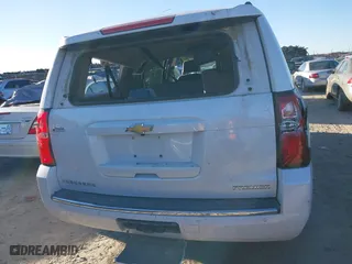 2019 Chevrolet Suburban Premier with VIN 1GNSCJKC0KR293658, listed as a IAAI auction lot 40563834 with 153,619 mi miles. Bid and sale history available at carsss.com. Image 16.
