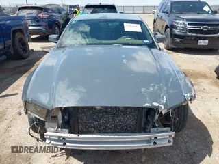 2013 Ford Mustang V6 with VIN 1ZVBP8AM0D5207837, listed as a IAAI auction lot 42464194 with 171,916 mi miles and . Bid and sale history available at DreamBid. Image 13.