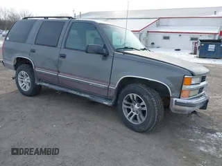 1999 Chevrolet Tahoe Z71 with VIN 1GNEK13R5XJ373210, listed as a IAAI auction lot 41401748 with 193,160 mi miles and . Bid and sale history available at DreamBid. Image 1.