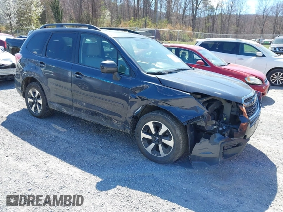 2018 Subaru Forester Premium with VIN JF2SJAGC4JH615487, listed as a IAAI auction lot 41854410 with 320,094 mi miles. Bid and sale history available at carsss.com. Image 1.