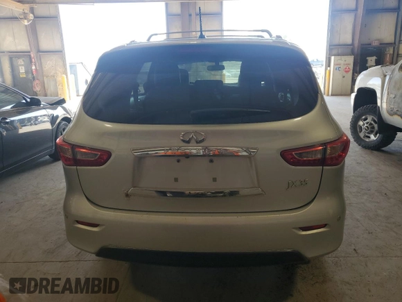 2013 Infiniti JX35 with VIN 5N1AL0MM3DC329297, listed as a Copart auction lot 74493194 with 144,639 mi miles and Salvage Title. Bid and sale history available at carsss.com. Image 6.