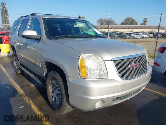 2007 GMC Yukon SLT with VIN 1GKFC13077J253697, listed as a IAAI auction lot 41277881 with 246,059 mi miles. Bid and sale history available at carsss.com. Image 1.