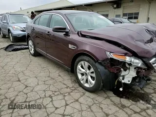 2011 Ford Taurus SEL z VIN 1FAHP2EW4BG167369, wystawiony jako Copart lot #52797525 z przebiegiem 98 696 mil mil oraz Czysty tytuł • Clean title. Historia ofert i sprzedaży dostępna na DreamBid. Obrazek 11.