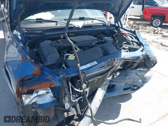 2004 Dodge Dakota Sport z VIN 1D7HG38N84S709758, wystawiony jako IAAI lot #42168491 z przebiegiem 238 479 mil mil oraz . Historia ofert i sprzedaży dostępna na DreamBid. Obrazek 6.