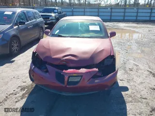 2004 Pontiac Grand Prix GT1 with VIN 2G2WP522741126274, listed as a IAAI auction lot 41439519 with 86,643 mi miles. Bid and sale history available at carsss.com. Image 6.