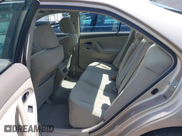 2007 Toyota Camry CE with VIN 4T1BE46KX7U716414, listed as a IAAI auction lot 42116250 with 104,298 mi miles and . Bid and sale history available at DreamBid. Image 8.