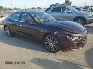 2018 Maserati Ghibli with VIN ZAM57XSA0J1286682, listed as a Copart auction lot 65457315 with 50,169 mi miles and Salvage title. Bid and sale history available at DreamBid. Image 4.