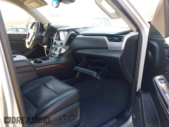 2019 GMC Yukon SLT with VIN 1GKS1BKC5KR277478, listed as a IAAI auction lot 41632624 with 86,770 mi miles. Bid and sale history available at carsss.com. Image 5.