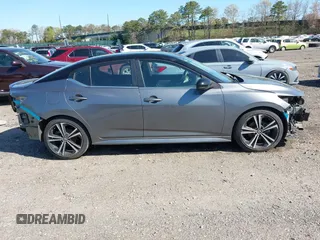 2020 Nissan Sentra SR z VIN 3N1AB8DVXLY262821, wystawiony jako IAAI lot #42085696 z przebiegiem 102 191 mil mil oraz . Historia ofert i sprzedaży dostępna na DreamBid. Obrazek 13.