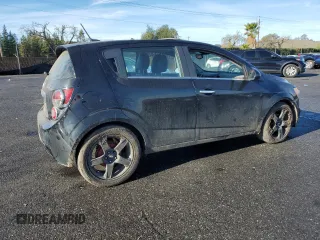 2012 Chevrolet Sonic LTZ z VIN 1G1JE6SH2C4126197, wystawiony jako Copart lot #85541214 z przebiegiem Nie podano mil oraz Szkoda całkowita • Salvage title. Historia ofert i sprzedaży dostępna na DreamBid. Obrazek 3.