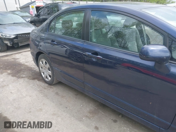 2010 Honda Civic LX with VIN 2HGFA1F52AH570385, listed as a IAAI auction lot 42234739 with 199,201 mi miles and . Bid and sale history available at DreamBid. Image 14.