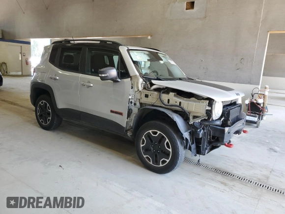 2016 Jeep Renegade Trailhawk with VIN ZACCJBCT3GPD16931, listed as a Copart auction lot 61857235 with 52,490 mi miles and Salvage title. Bid and sale history available at DreamBid. Image 4.