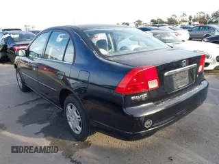 2001 Honda Civic LX with VIN 2HGES16501H619916, listed as a IAAI auction lot 41599951 with 230,395 mi miles. Bid and sale history available at carsss.com. Image 3.