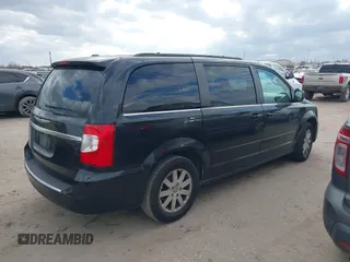 2015 Chrysler Town & Country LX with VIN 2C4RC1AG6FR677178, listed as a IAAI auction lot 41532707 with 135,286 mi miles and . Bid and sale history available at carsss.com. Image 4.