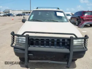 1995 Jeep Grand Cherokee Laredo with VIN 1J4GZ58Y5SC541987, listed as a IAAI auction lot 42430890 with 246,824 mi miles and . Bid and sale history available at DreamBid. Image 6.