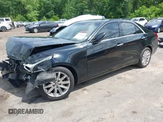 2016 Cadillac CTS AWD with VIN 1G6AW5SX7G0129019, listed as a IAAI auction lot 42148335 with 86,023 mi miles and . Bid and sale history available at DreamBid. Image 18.