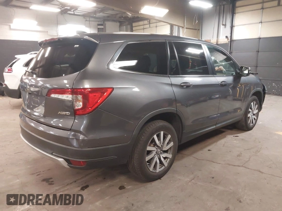 2019 Honda Pilot EX-L with VIN 5FNYF6H57KB062293, listed as a IAAI auction lot 41936964 with 93,012 mi miles and . Bid and sale history available at DreamBid. Image 4.