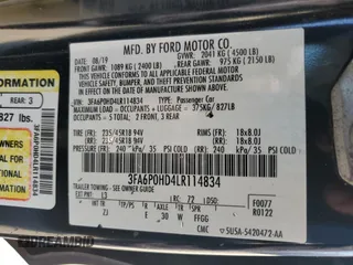 2020 Ford Fusion SE z VIN 3FA6P0HD4LR114834, wystawiony jako Copart lot #60224845 z przebiegiem 84 110 mil mil oraz Szkoda całkowita • Salvage title. Historia ofert i sprzedaży dostępna na DreamBid. Obrazek 12.