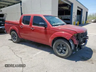2012 Nissan Frontier SV with VIN 1N6AD0ER3CC434817, listed as a Copart auction lot 60670635 with 186,485 mi miles and Salvage title. Bid and sale history available at DreamBid. Image 4.
