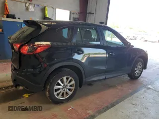 2016 Mazda CX-5 Sport with VIN JM3KE4BY1G0870166, listed as a Copart auction lot 60433035 with 93,433 mi miles and Salvage title. Bid and sale history available at DreamBid. Image 3.