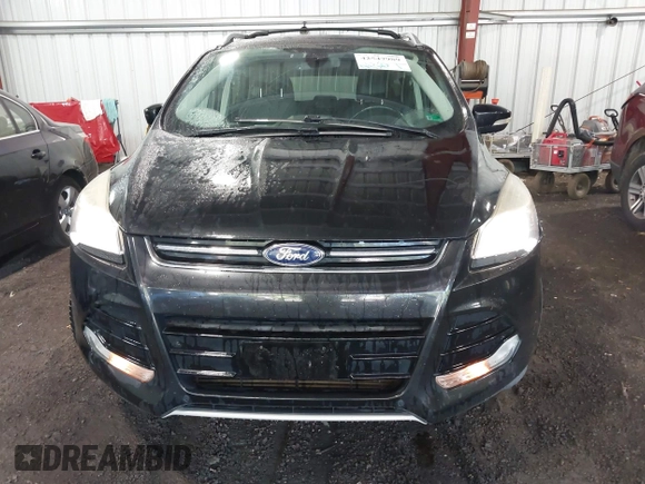 2015 Ford Escape Titanium with VIN 1FMCU9J98FUB00525, listed as a IAAI auction lot 42547989 with 194,040 mi miles and . Bid and sale history available at DreamBid. Image 12.